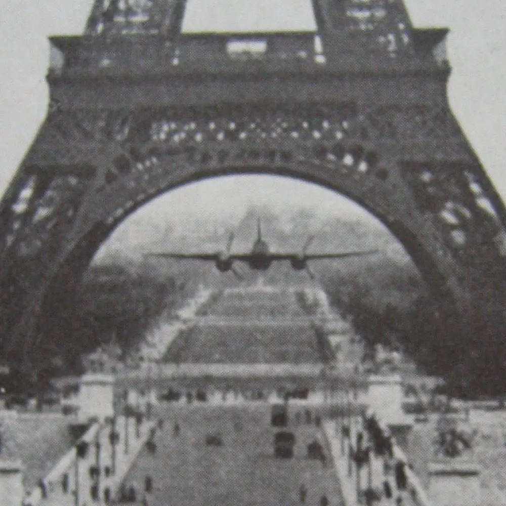 Black and white photo of the Eiffel Tower during World War II occupation